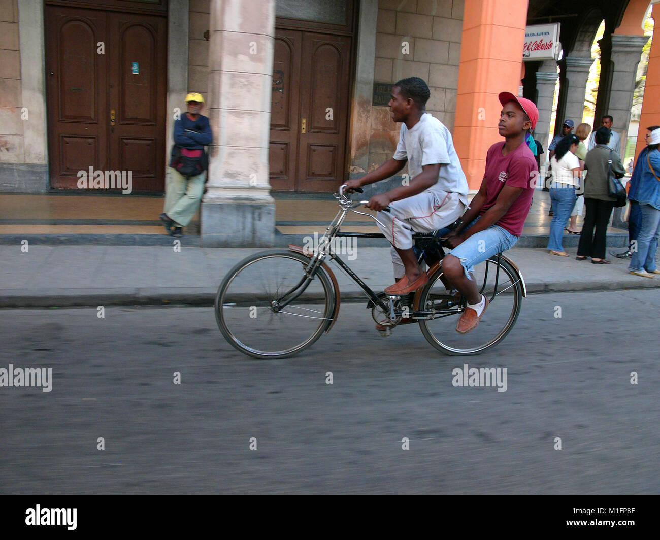 Feb 15, 2006; Havana, CUBA; Scene in Havana Viejo. One in eight cars in Cuba today is a pre-1960s American brand Ford, Chevrolet, Cadillac, Chrysler, Packard and other classic models. The Republic of Cuba is located in the northern Caribbean and south of the United States. The first European to visit Cuba was explorer Christopher Columbus in 1492. Centuries of colonial rule and revolutions followed. Batista was deposed by Fidel Castro and Che guevara in 1953. After the revolution trade with comminist Russia grew. The economy was hit hard in the 1990s following the collapse of the Soviet Union. Stock Photo