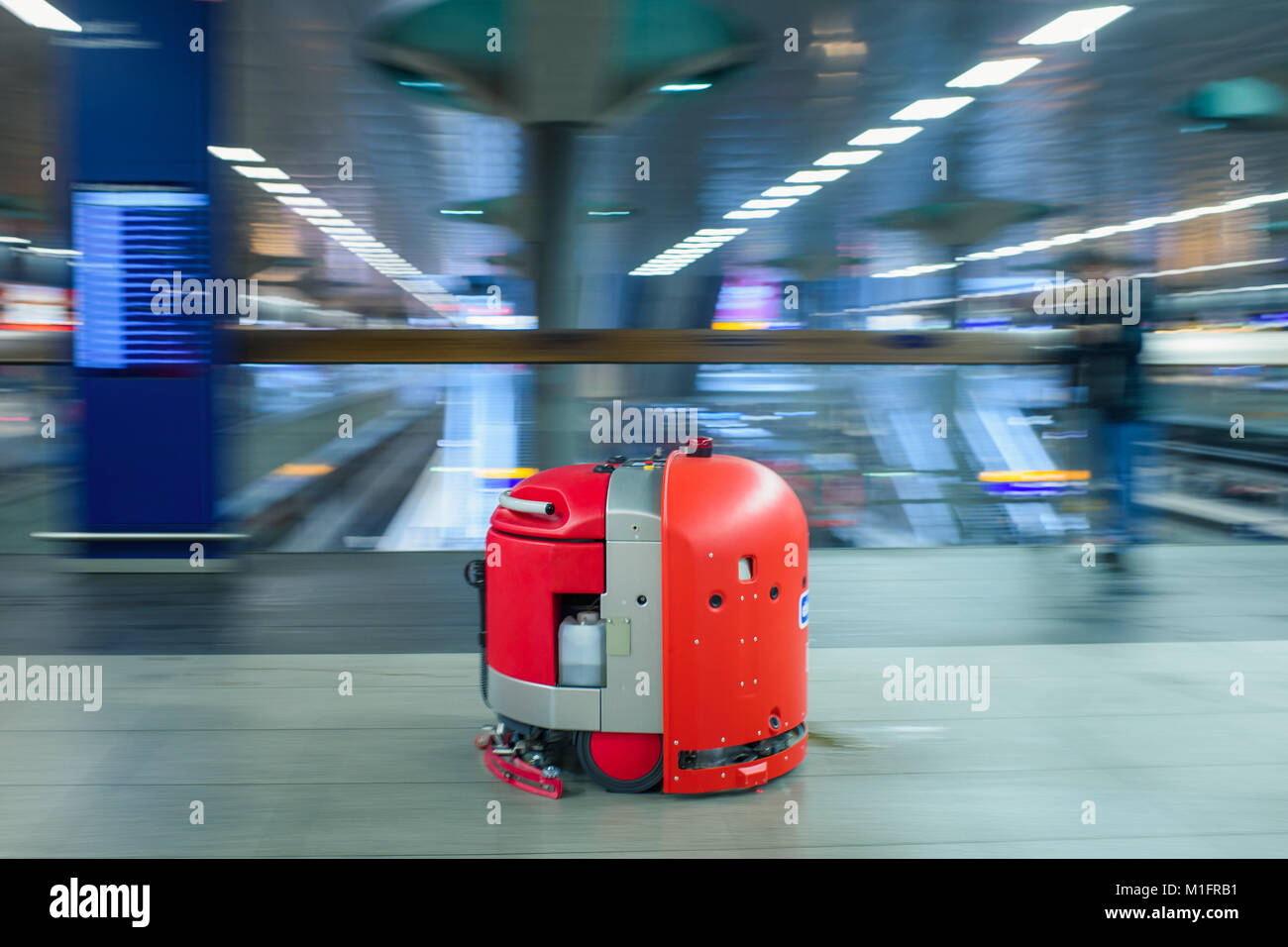 Berlin, Germany. 30th Jan, 2018. A Cleanfix RA660 navigator cleaning robot  driving through a closedoff area during a race between four manufacturers  of cleaning robots at the main station in Berlin, Germany,