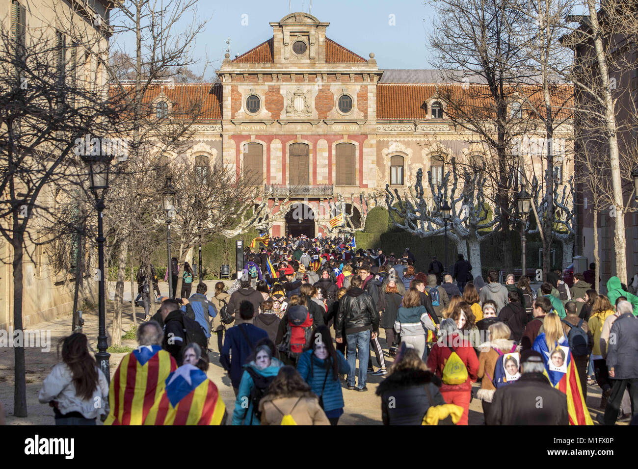 Barcelona, Spain. 30th Jan, 2018. Protesters seen during a demonstration to support Carles Puigdemont, former Catalan President as they march toward the Catalonia Parliament in Barcelona.Roger Torrent, President of the Catalonia Parliament, has finally canceled the parliamentary session who was scheduled for January 30, 2018 which could have form a new regional government. Credit: Victor Serri/SOPA/ZUMA Wire/Alamy Live News Stock Photo