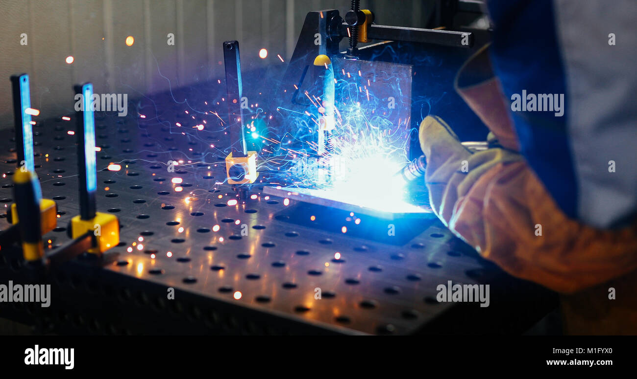 Metal worker welding in metal industry factory Stock Photo Alamy