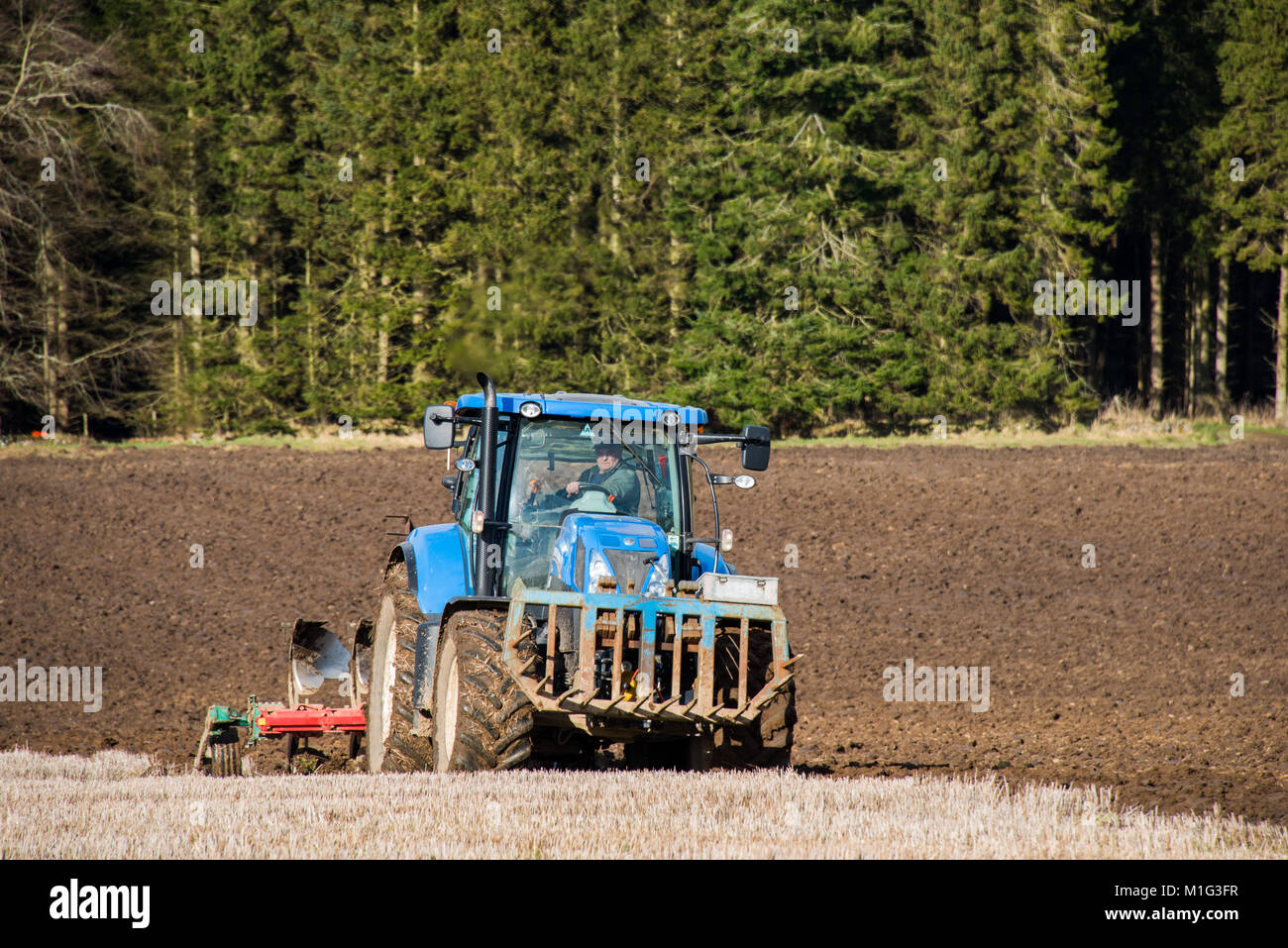 A tractor ploughing on the Haddo Estate in rural Aberdeenshire