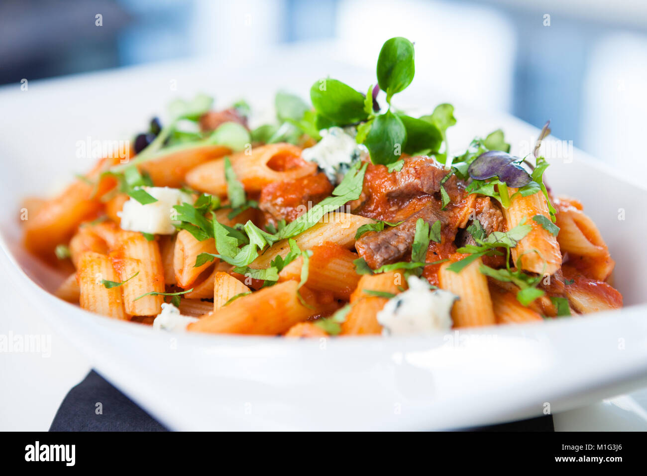 Tomato pasta with beef Stock Photo - Alamy