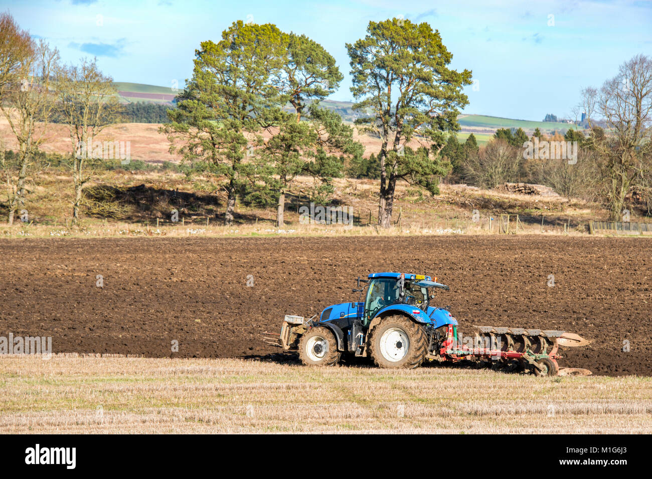 A tractor ploughing on the Haddo Estate in rural Aberdeenshire