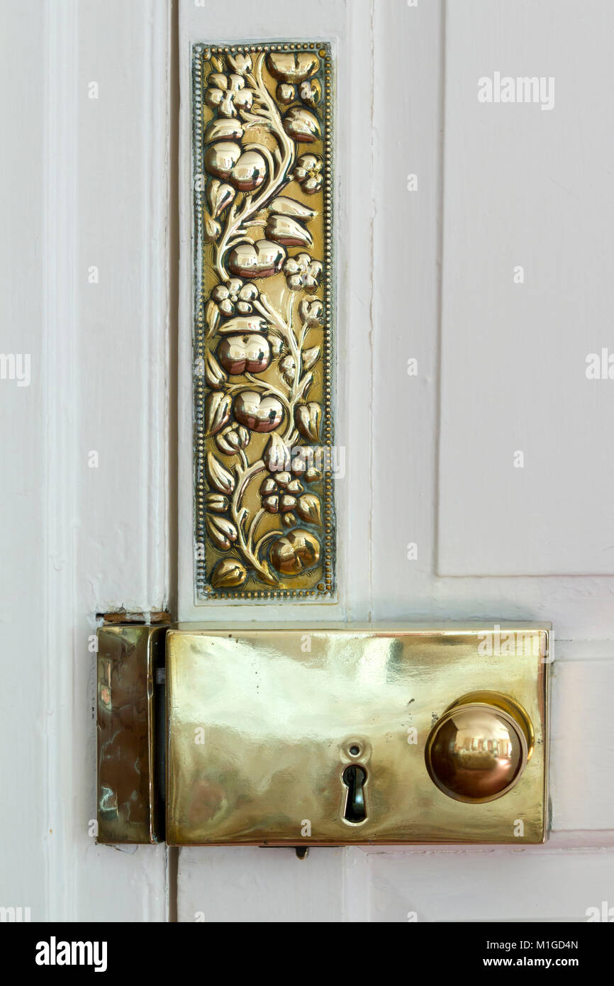Antique brass door furniture close up Stock Photo