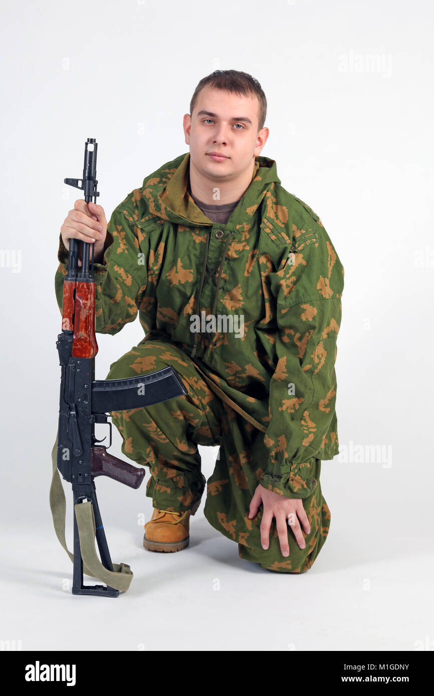 Russian soldier in camouflage with gun Stock Photo