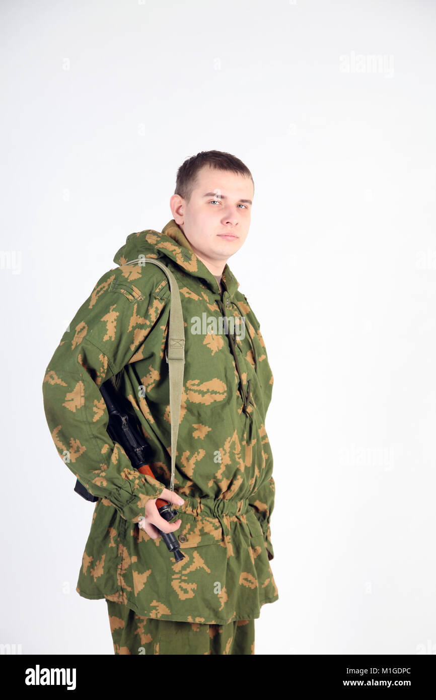 Russian soldier in camouflage with gun Stock Photo - Alamy