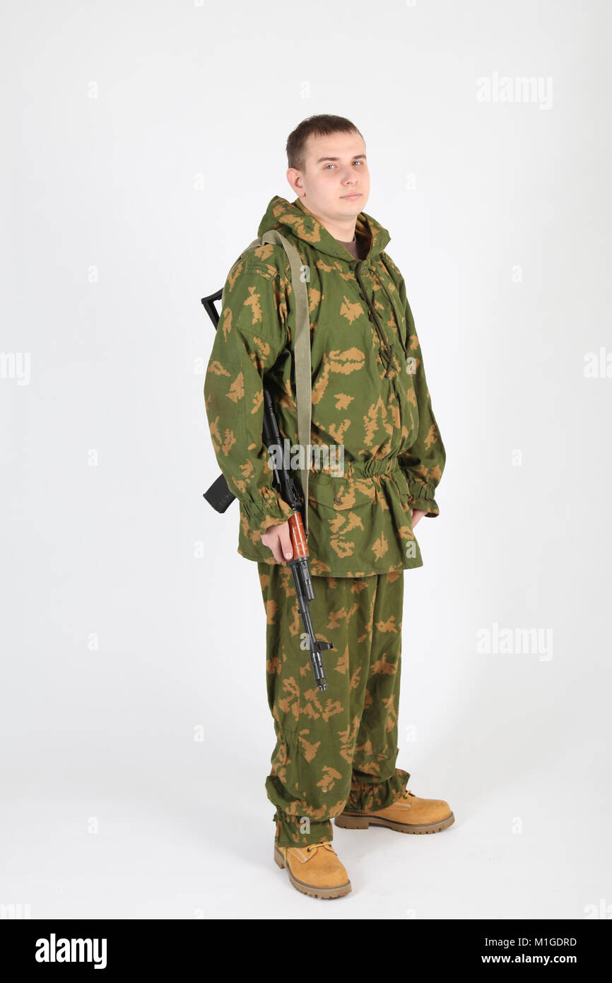 Russian soldier in camouflage with gun Stock Photo