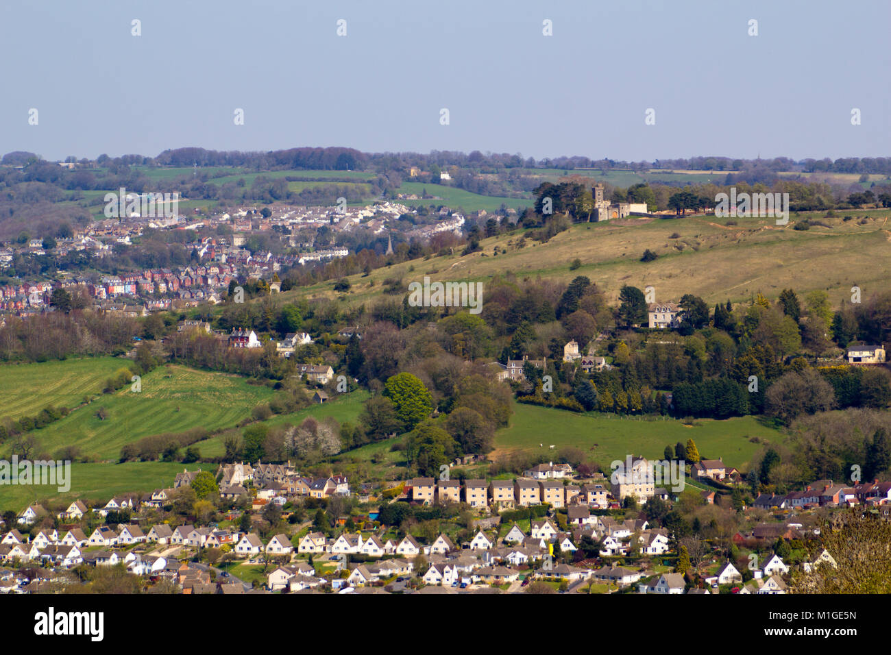 The view over Stroud to Rodborough Common and Fort and the Stroud Valleys, Gloucestershire, Cotswolds, UK Stock Photo
