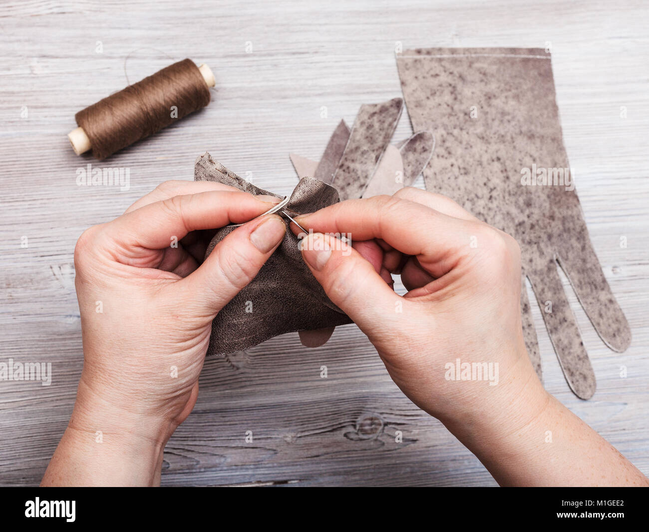 on sewing gloves glover stitches the genuine leather gloves