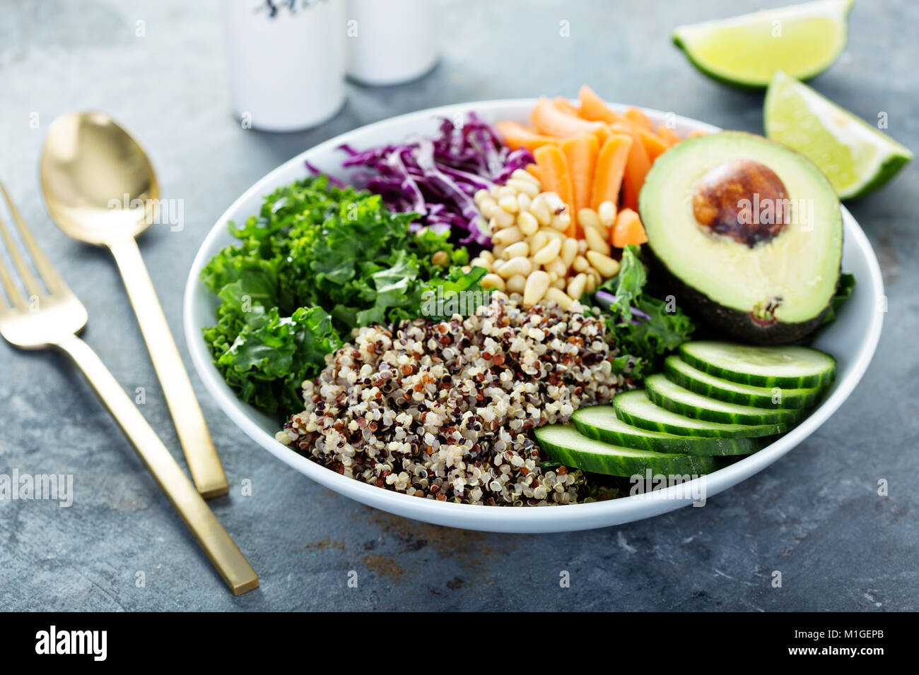 Vegan bowl with fresh vegetables, avocado and quinoa Stock Photo