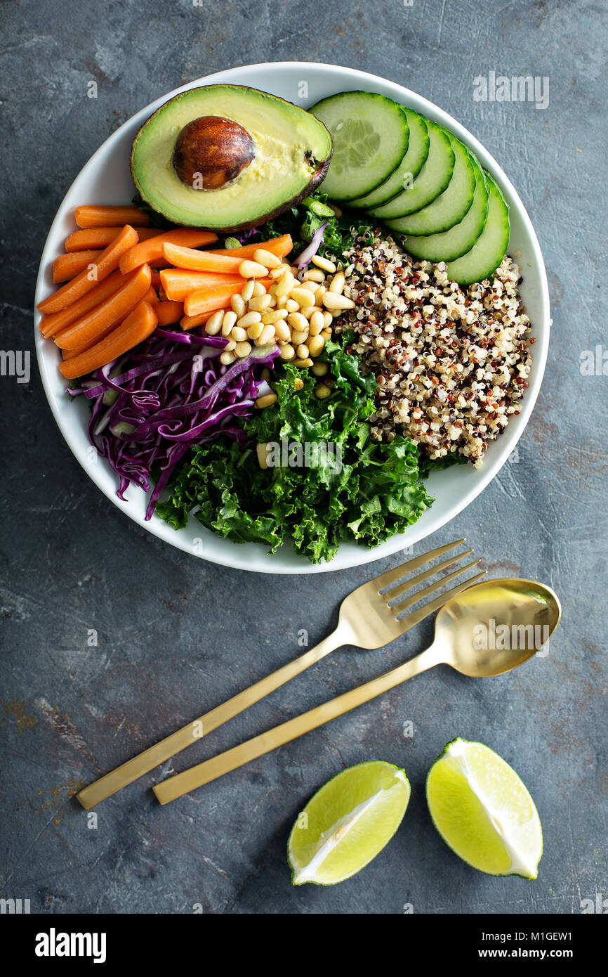 Vegan bowl with fresh vegetables, avocado and quinoa Stock Photo