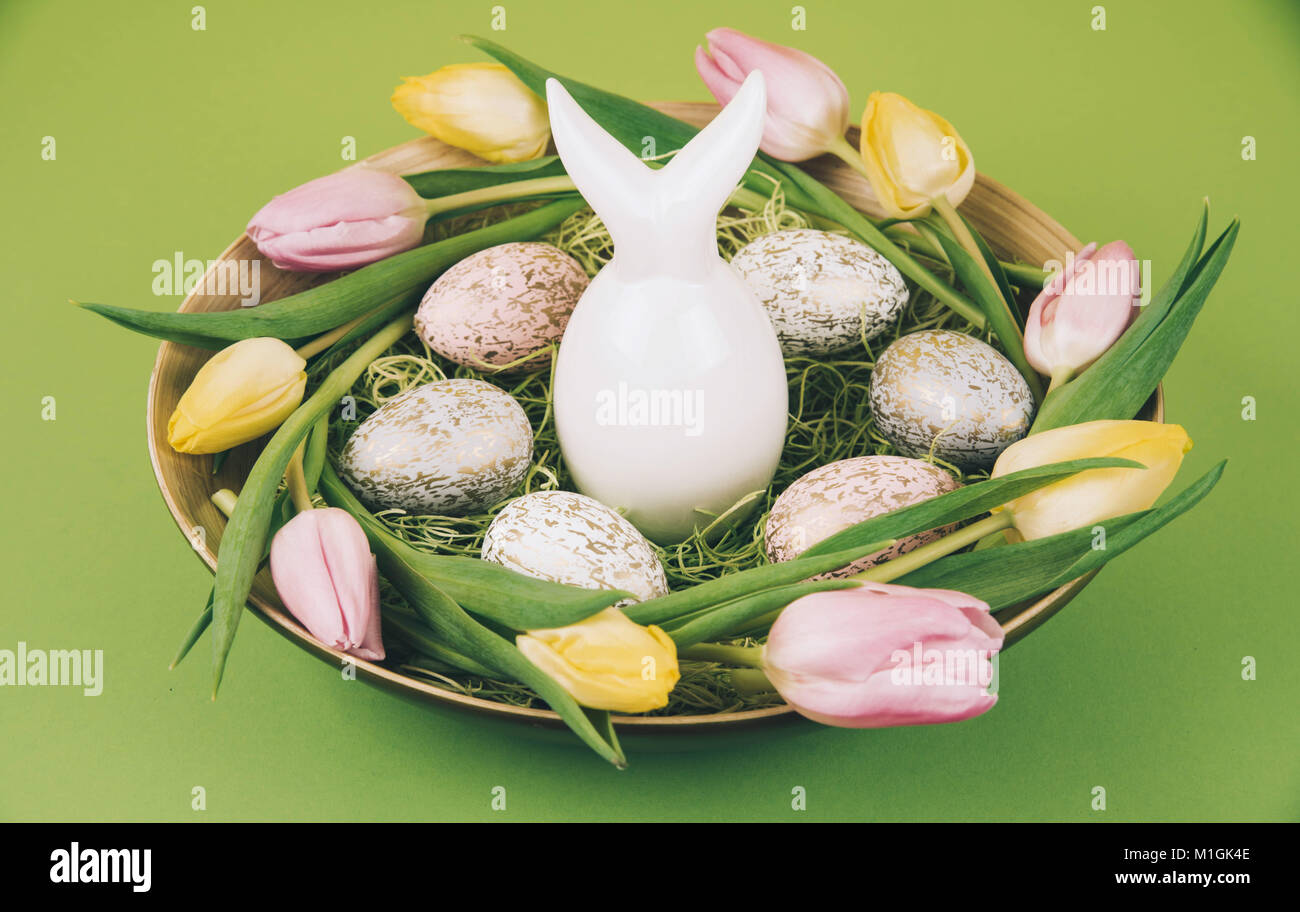 Easter composition with painted eggs and easter bunny Stock Photo - Alamy