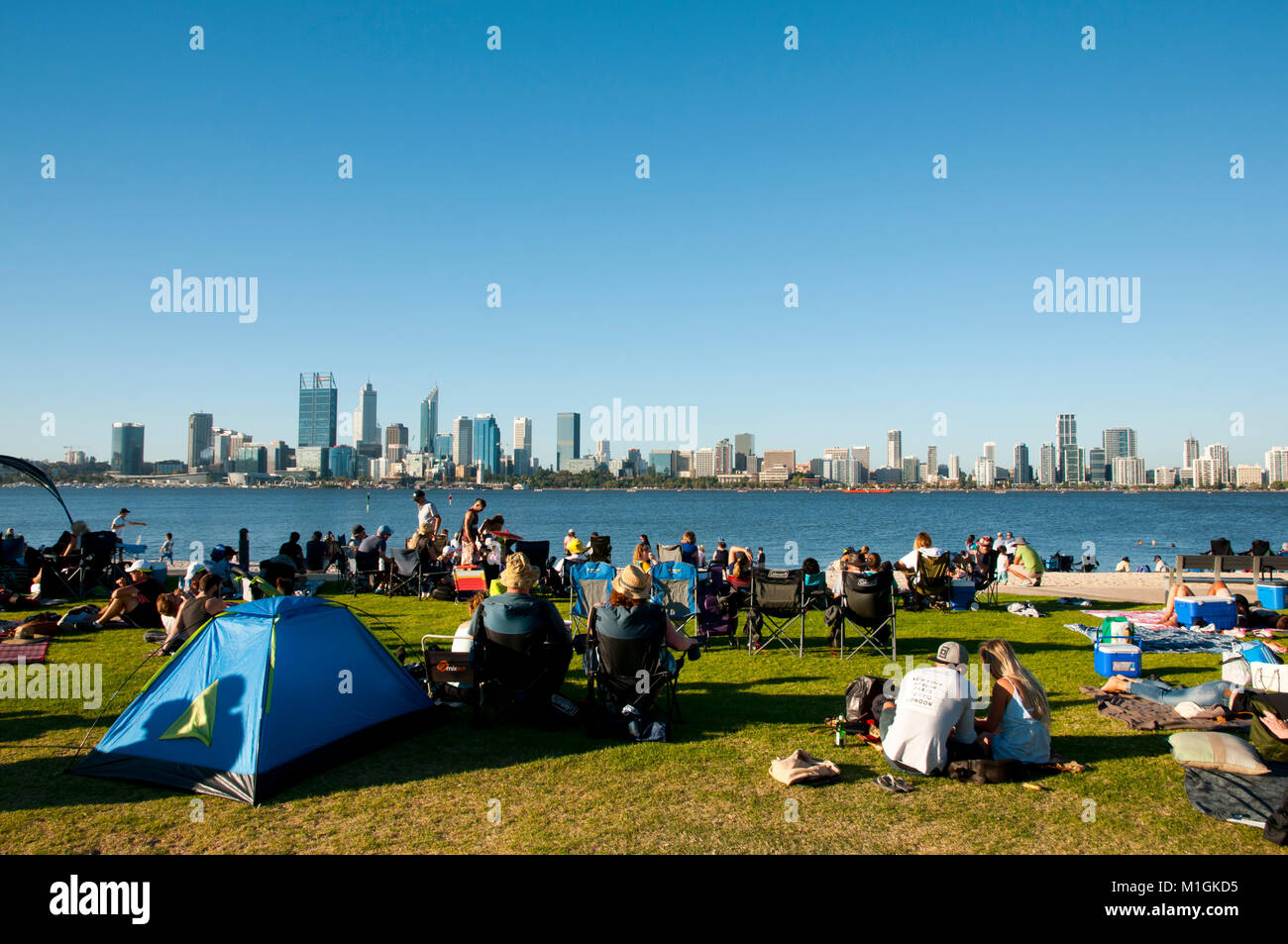 PERTH, AUSTRALIA - January 26, 2018: People gathered on South Perth Foreshore awaiting the annual Australia Day Skyworks fireworks Stock Photo
