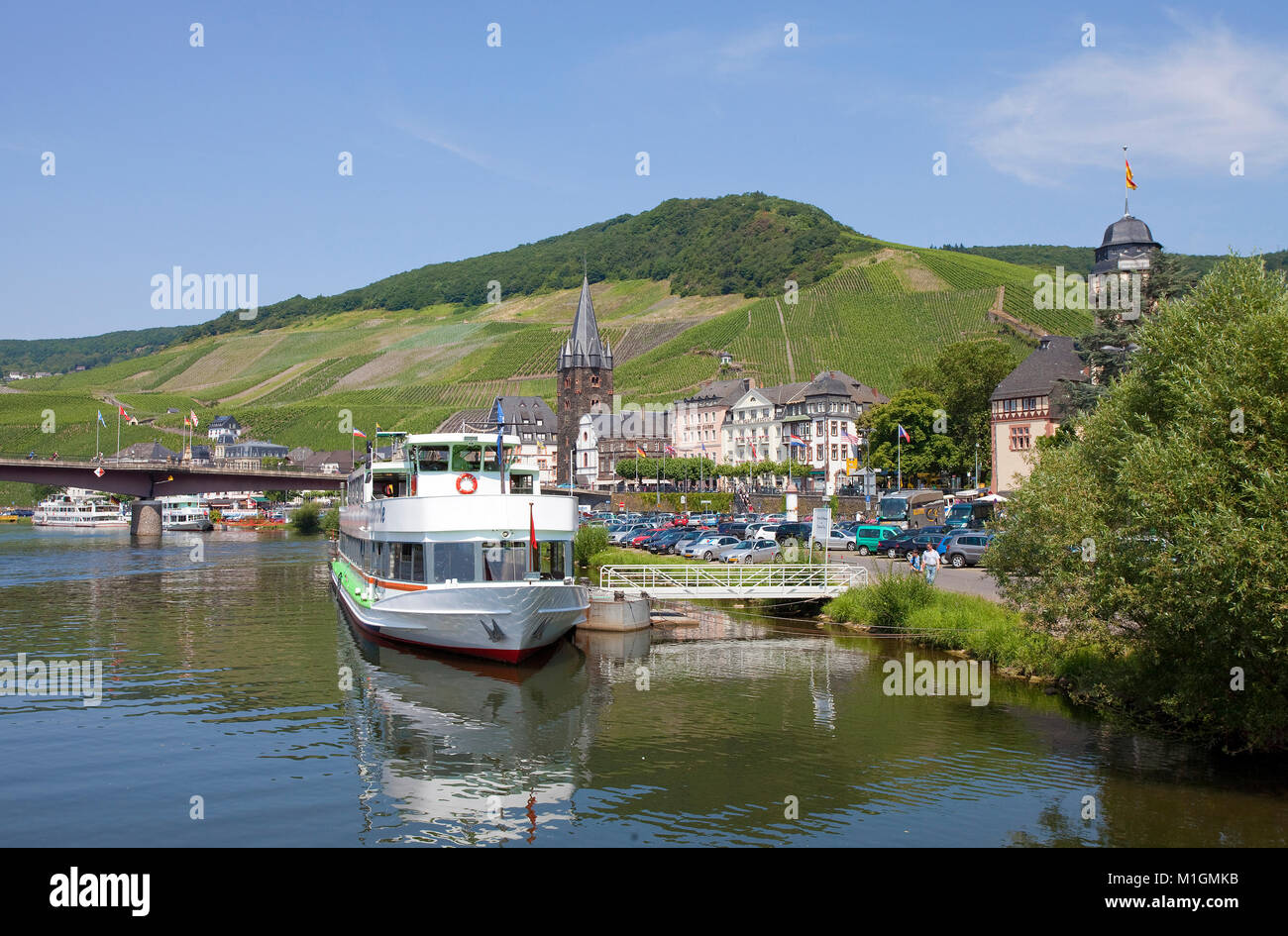 Excursion ship at landing stage of wine village Bernkastel-Kues, Moselle river, Rhineland-Palatinate, Germany, Europe Stock Photo
