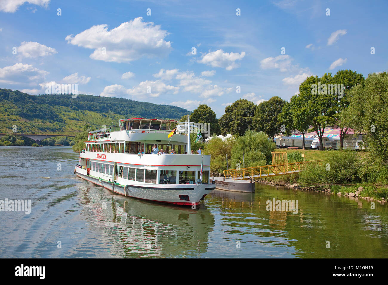 Excursion ship at landing stage of Zeltingen-Rachtig, Moselle river, Rhineland-Palatinate, Germany, Europe Stock Photo