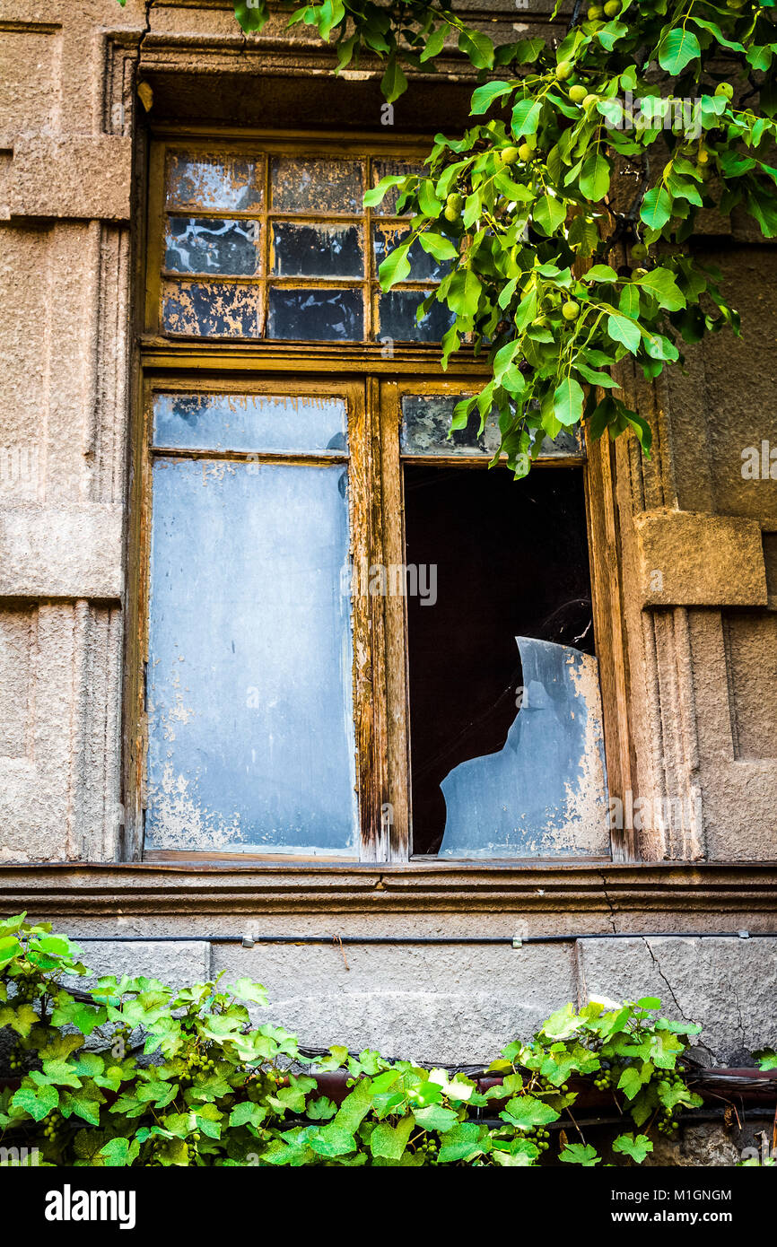 Broken glass of a window of an apartment house Stock Photo Alamy