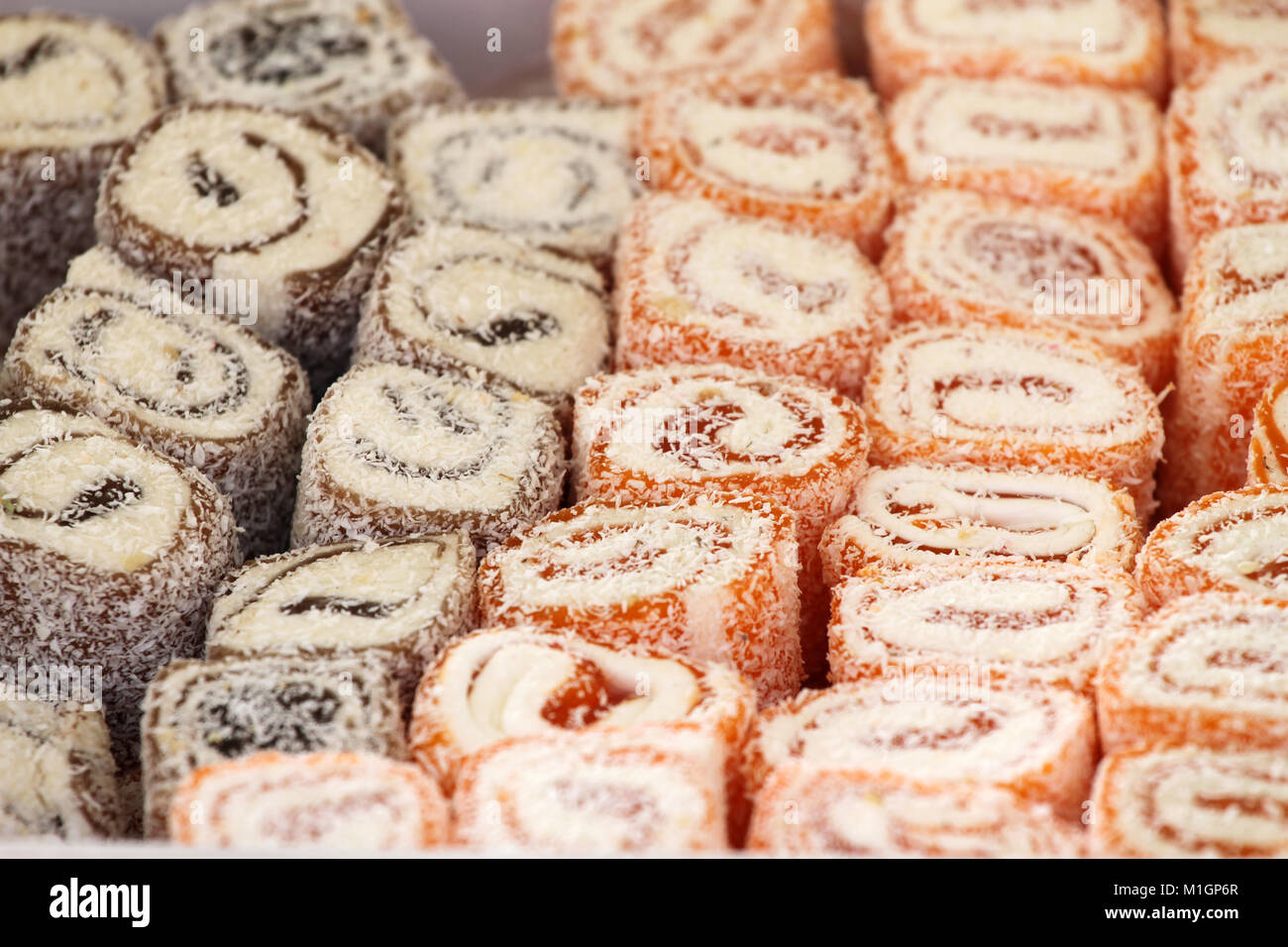 Turkish delight. Lokum. Sweet candies with nuts. turkish delight for dessert. Cezerye or lokum. Turkish candies and sweets, tasty background texture, Stock Photo