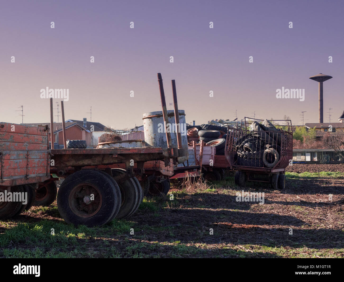vehicles loaded with car tires, ready to be disposed of in landfills Stock Photo