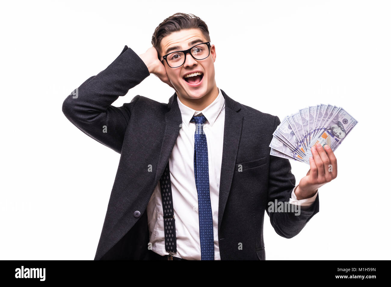 Portrait of a business man holding money, isolated on white Stock Photo ...