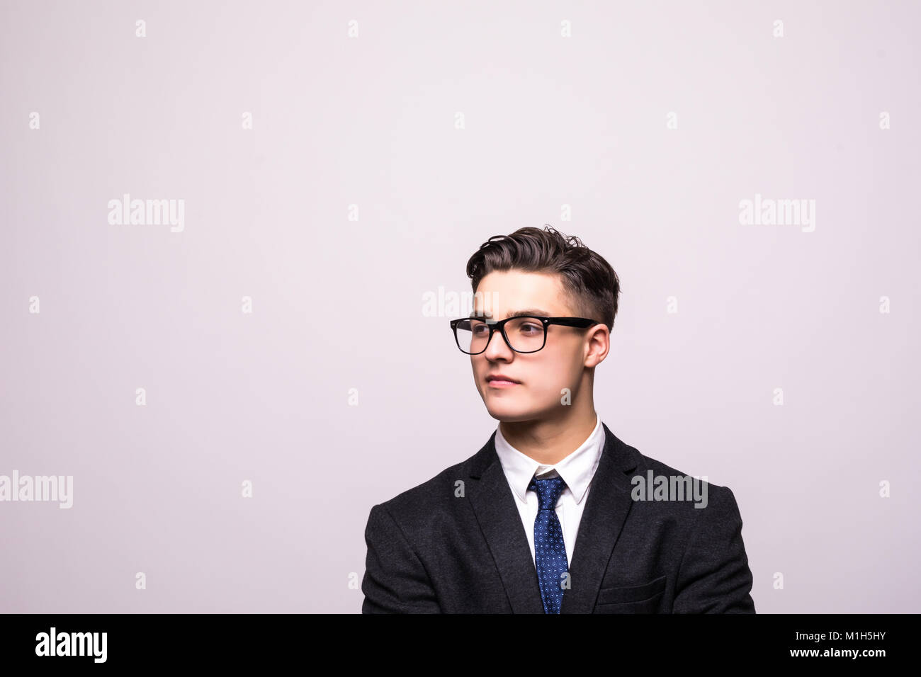 Portrait of handsome cheerful young smiling man in glasses Stock Photo ...