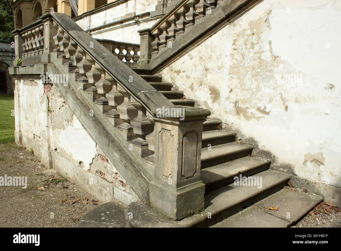 View of the old castle stone staircase with railing and flaked walls Stock  Photo - Alamy