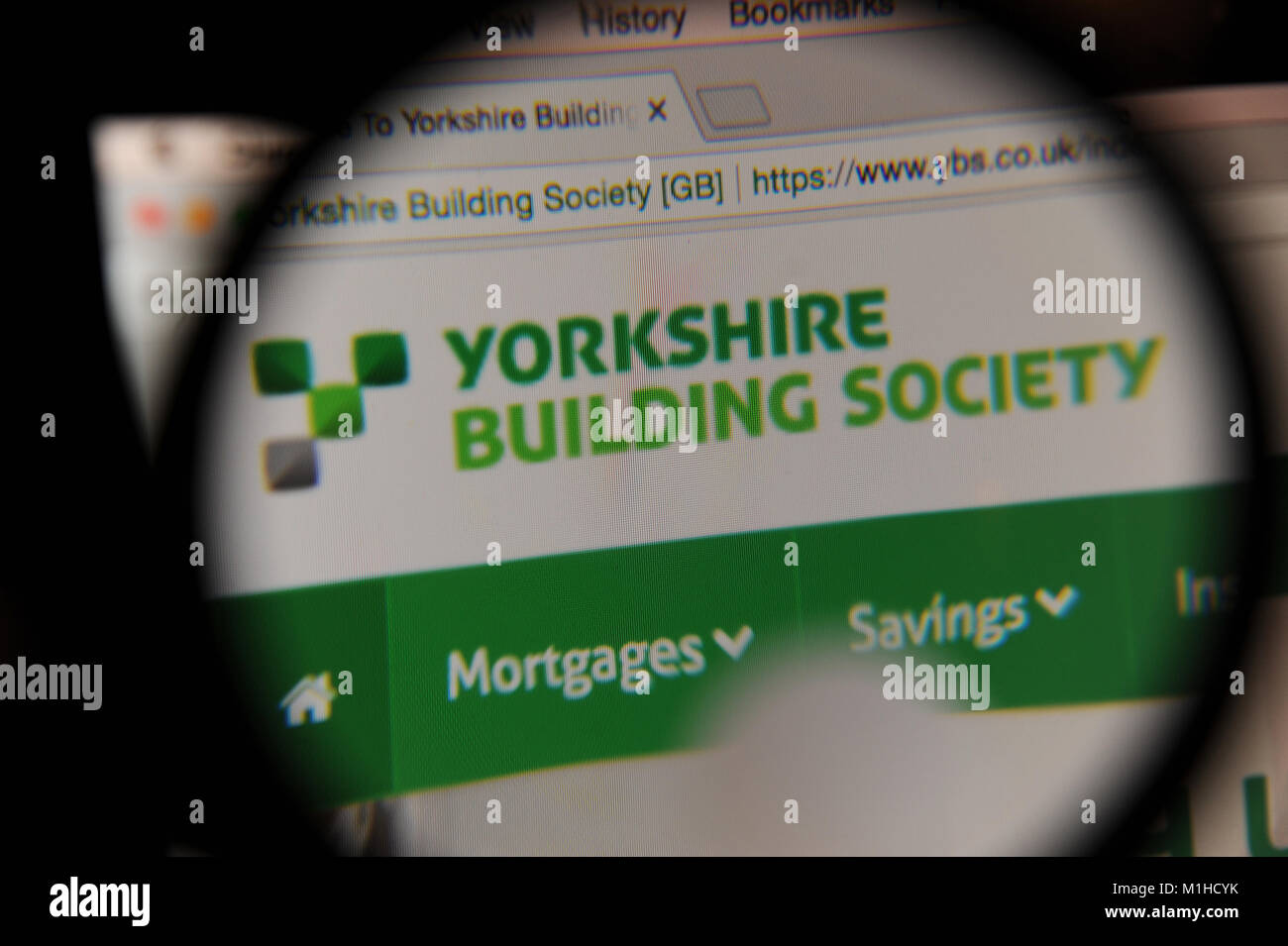 The Yorkshire Building Society website seen through a magnifying glass Stock Photo