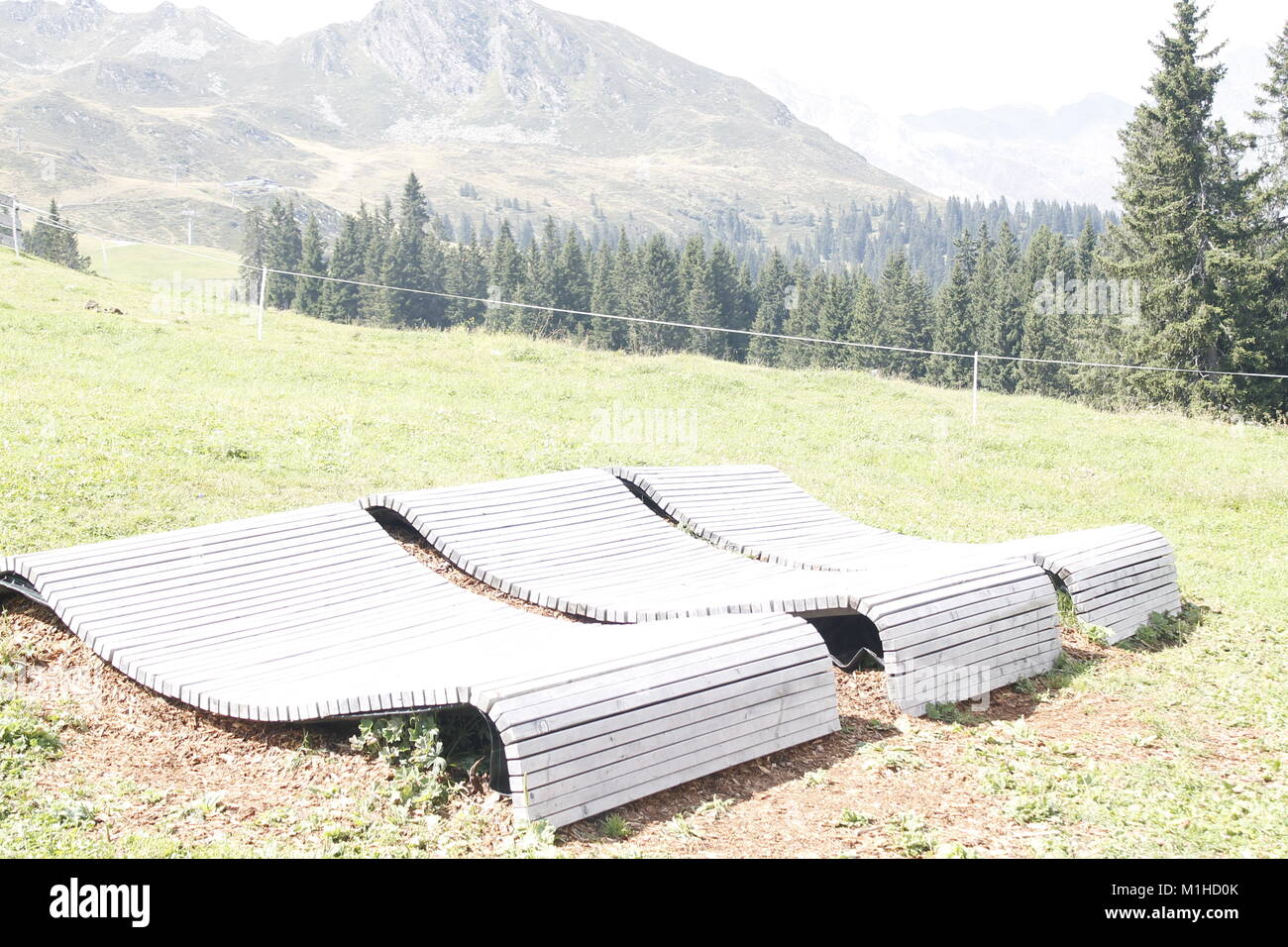 wooden deckchair to relax in the mountains Stock Photo