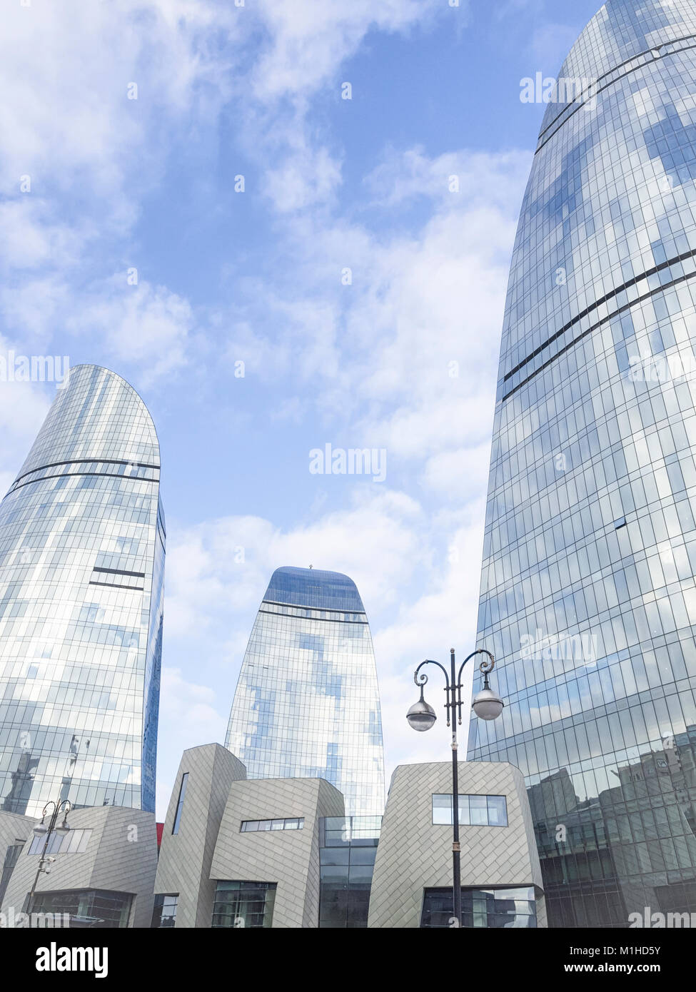 BAKU, AZERBAIJAN-DECEMBER 27, 2017: Modern architecture of Baku City, Azerbaijan. Flame towers is one of the most famous buildings in Baku. Stock Photo