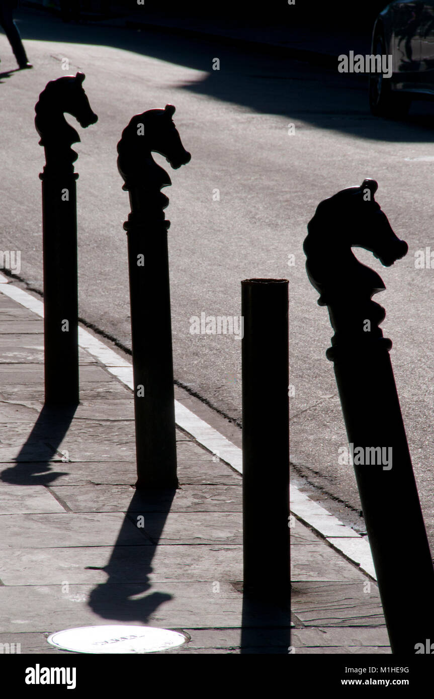 Horse head hitching posts Stock Photo