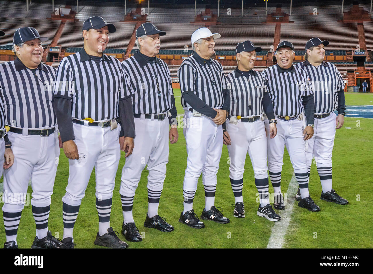Miami Florida,Orange Bowl,All American Offense Defense Bowl,high school football referees,officials,striped uniforms,man men male,FL080109021 Stock Photo