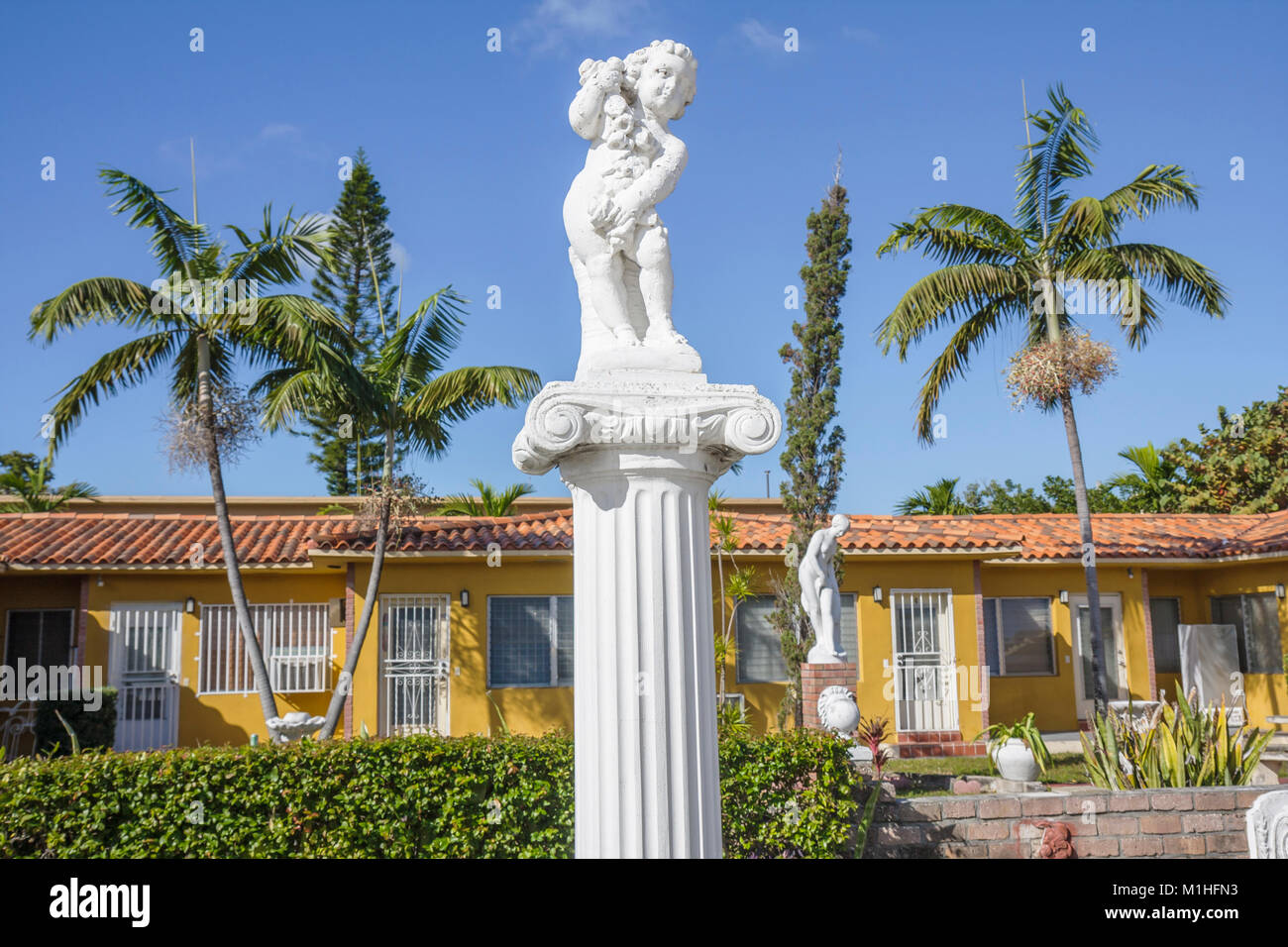 Miami Florida,Little Havana,condominium residential apartment apartments building buildings housing,residences,courtyard,pedestal,classical statue,pal Stock Photo