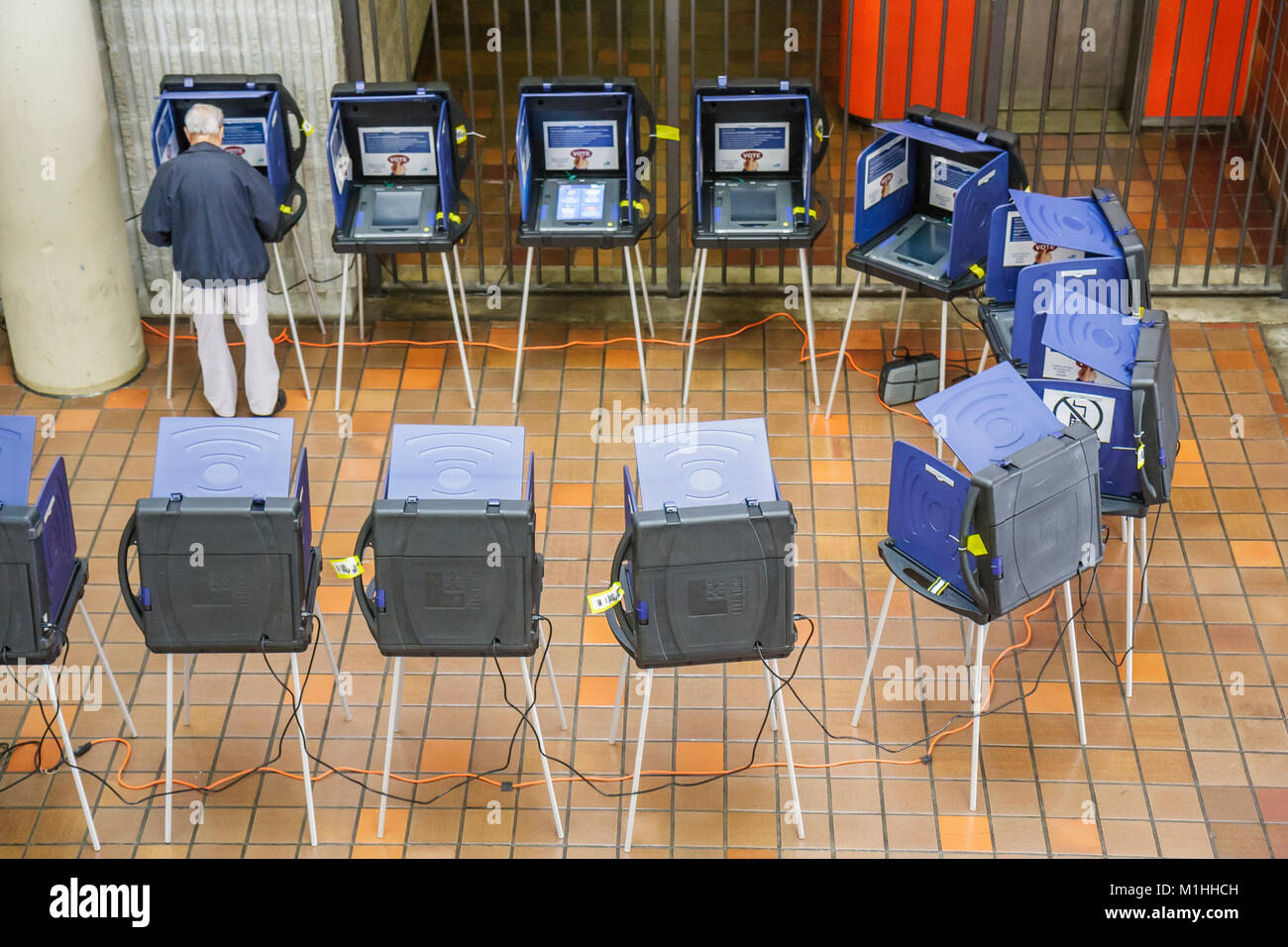 Miami Florida,Stephen P. Clark Government Center,centre,presidential primary,early voting,machine,democracy,election,decision,adult adults man men mal Stock Photo