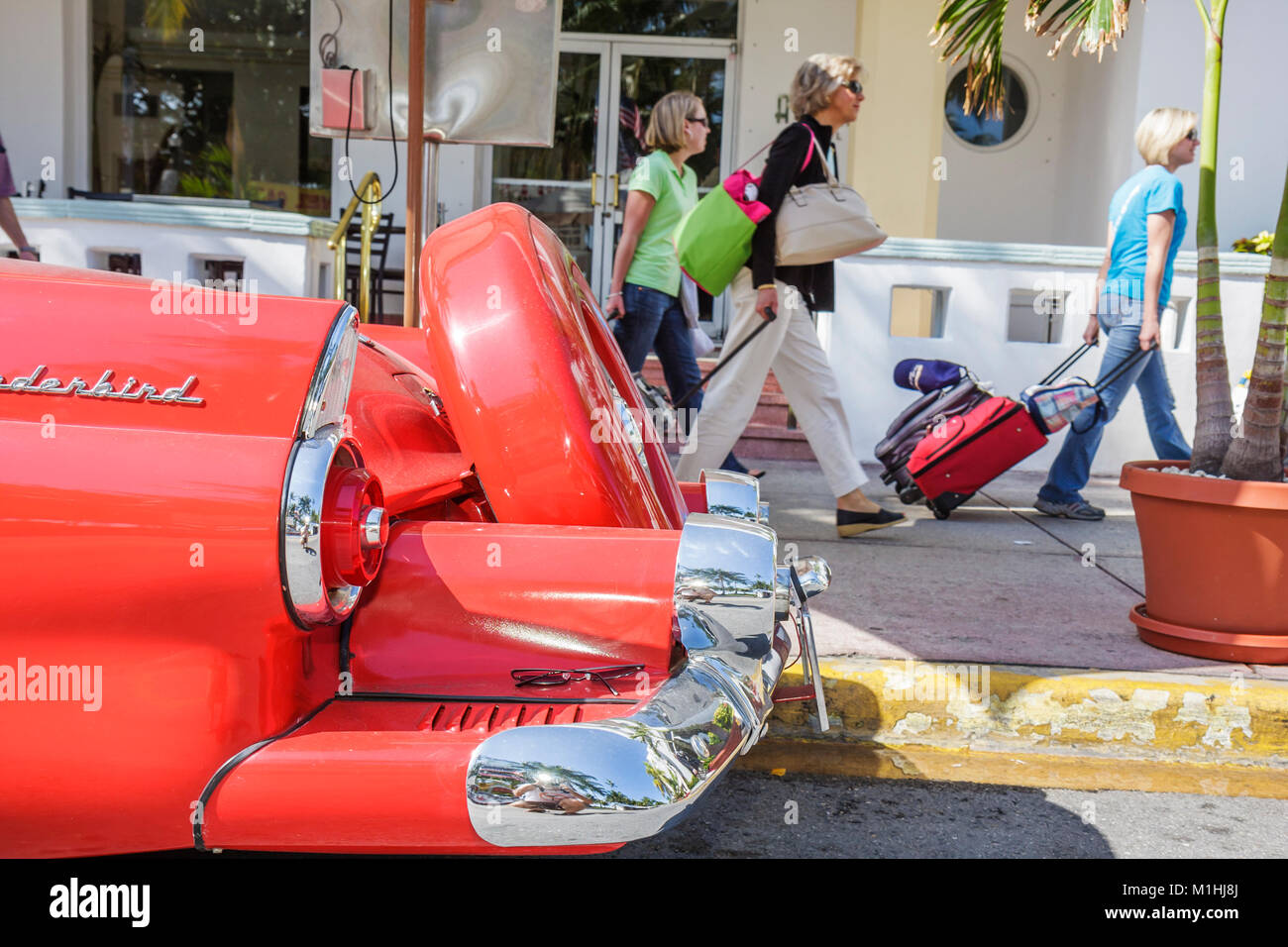 Miami Beach Florida,Ocean Drive,red Ford Thunderbird,classic car cars,cars,automobile,automobiles,auto,autos,vehicle,vehicles,visitors travel travelin Stock Photo