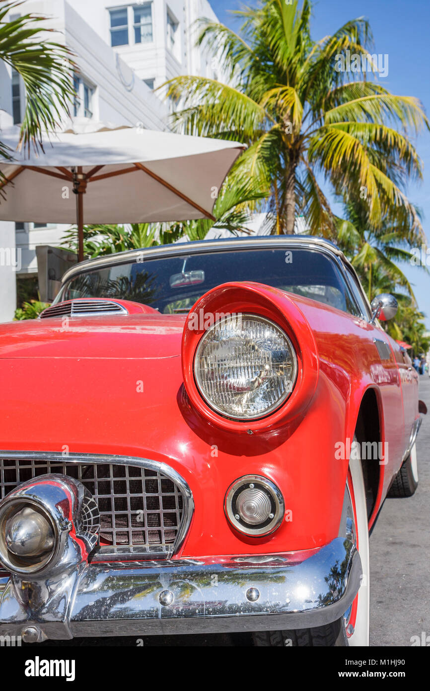 Miami Beach Florida,Ocean Drive,red Ford Thunderbird,classic car cars,cars,automobile,automobiles,auto,autos,vehicle,vehicles,visitors travel travelin Stock Photo
