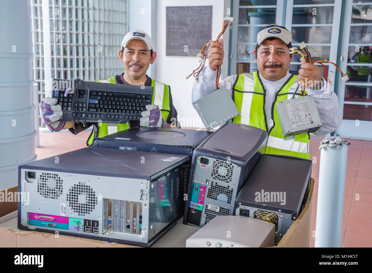 Miami Beach Florida,Address the Mess,recycling,electronics,computer drives,Hispanic man men male,FL080119083 Stock Photo