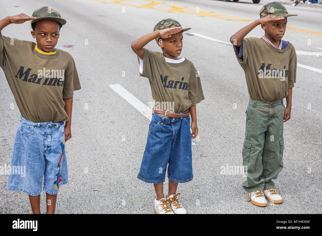 Miami Florida,Liberty City,Martin Luther King Jr. Parade,participant,community Black boy boys male kids children junior Marines,military,camouflage,sa Stock Photo