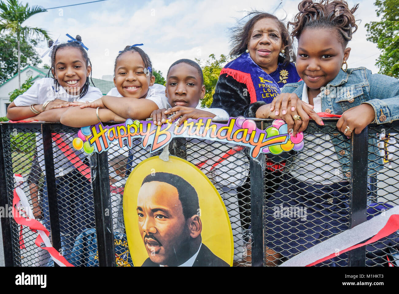 Miami Florida,Liberty City,Martin Luther King Jr. Parade,participant,community Black girl girls,female kid kids child children youngster,boy boys,male Stock Photo