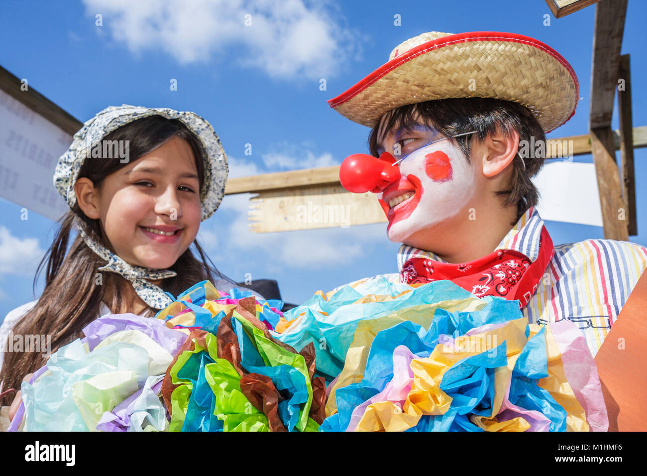 Miami Florida,Homestead,Rodeo Parade,participant,community event,tradition,clown,girl girls,female kid kids child children youngster youngsters youth Stock Photo
