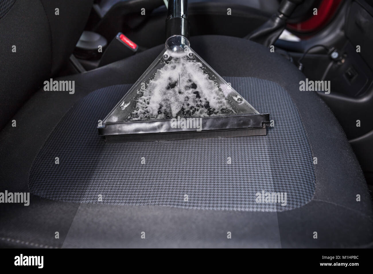 Closeup Of Vacuum Cleaner Vacuuming Car Seat Stock Photo Alamy