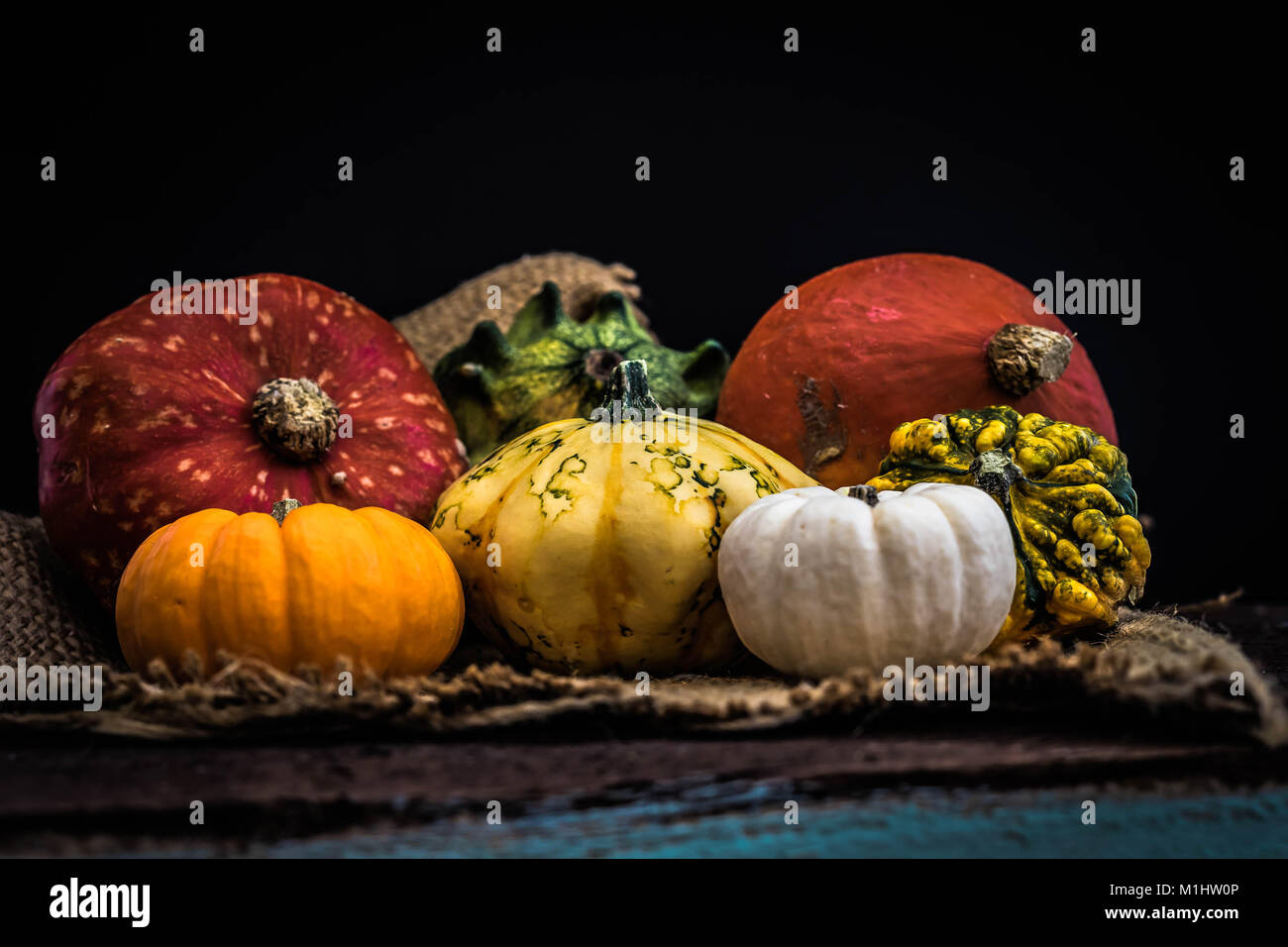 A selection of Autumn Squash on hessian Stock Photo