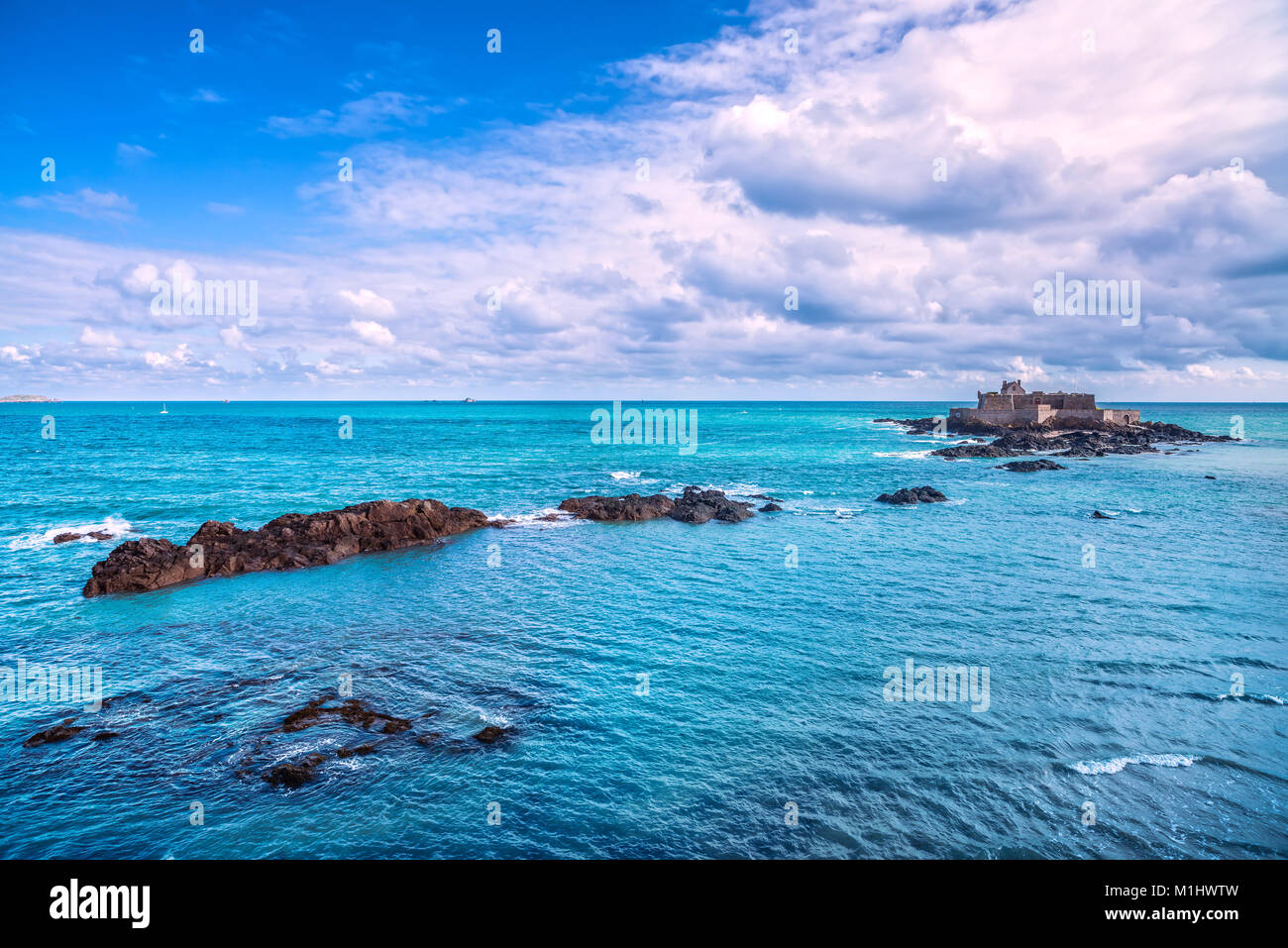 Saint Malo beach, Fort National and rocks during High Tide. Brittany, France, Europe. Stock Photo