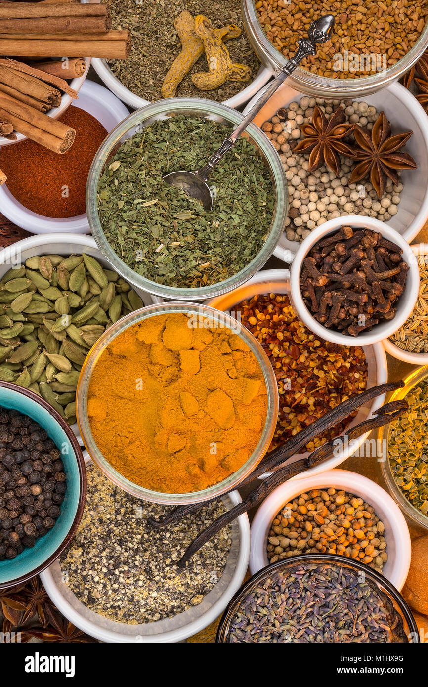 A selection of dried herbs and spices. Use in cooking to add seasoning ...