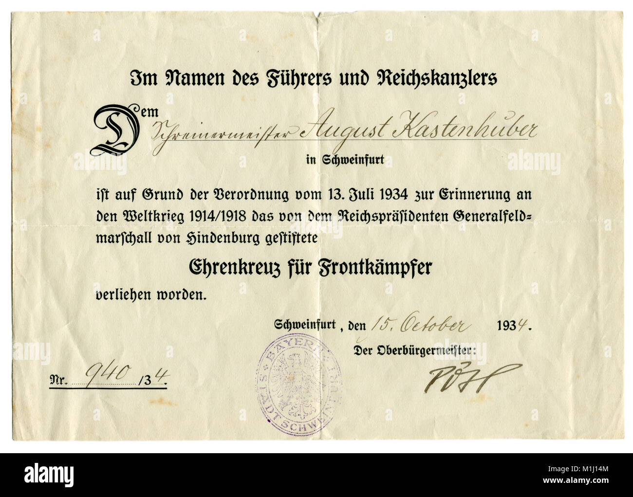 Old German award document for the Hindenburg cross for a veteran. Third Reich, Bavaria, Schweinfurt, the first world war, 1934 Stock Photo
