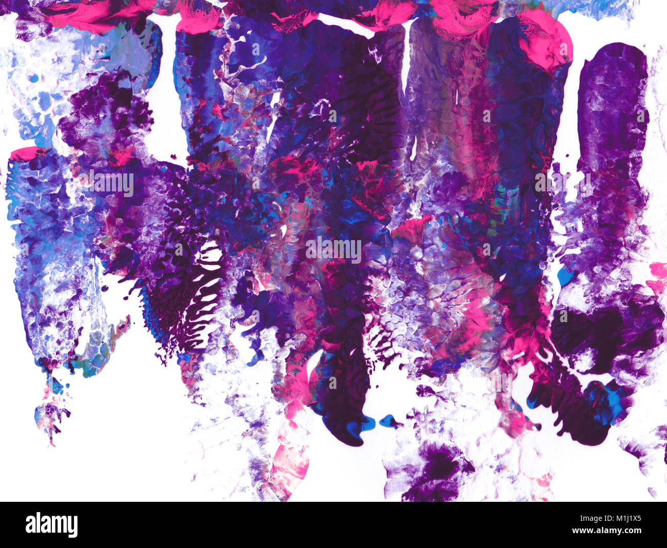 Purple and pink acrylic paint in abstract smears on white paper background Stock Photo