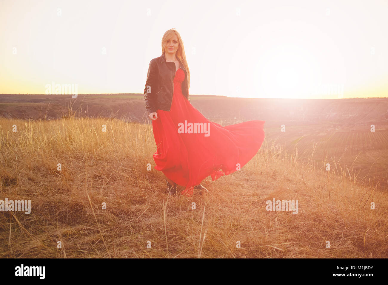 Girl in red dress Stock Photo - Alamy