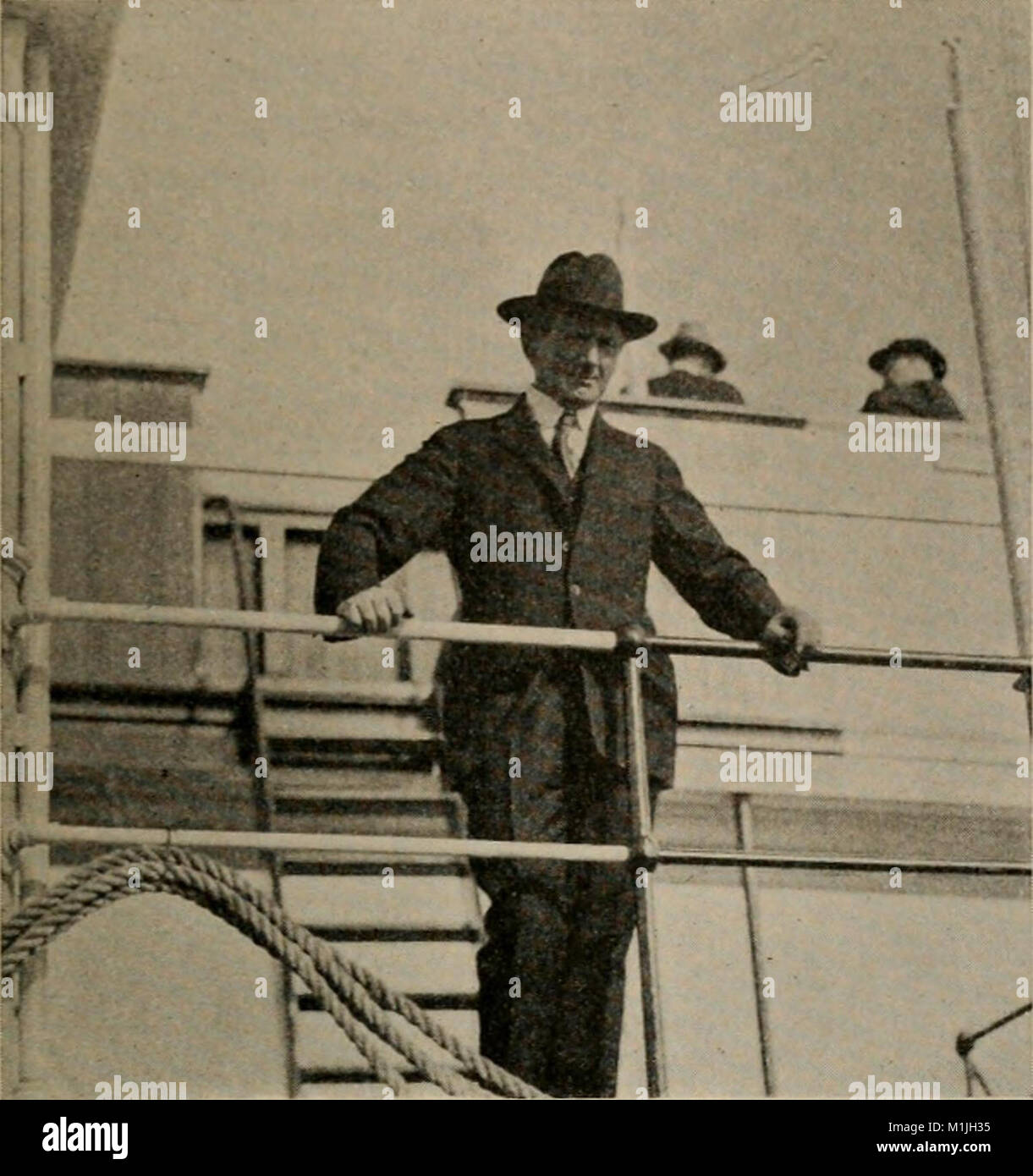 A. L. Becker casting an eye over a newly completed ship, 1918 Stock