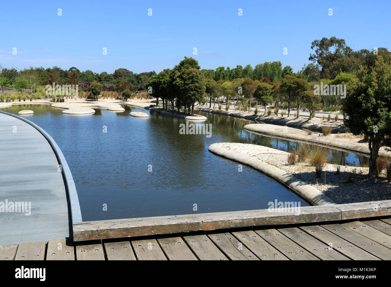 Man made lake at Australian Garden Cranbourne Melbourne Victoria Australia Stock Photo