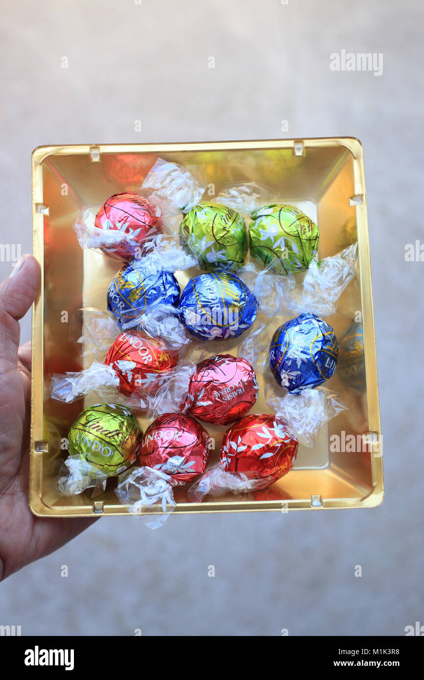 Close up of Assorted Lindt Lindor Chocolates in gold colour box Stock