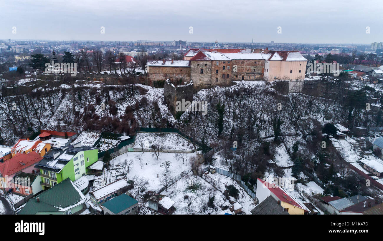 aerial beatiful grimly view on Uzhhorod Castle in winter. Stock Photo