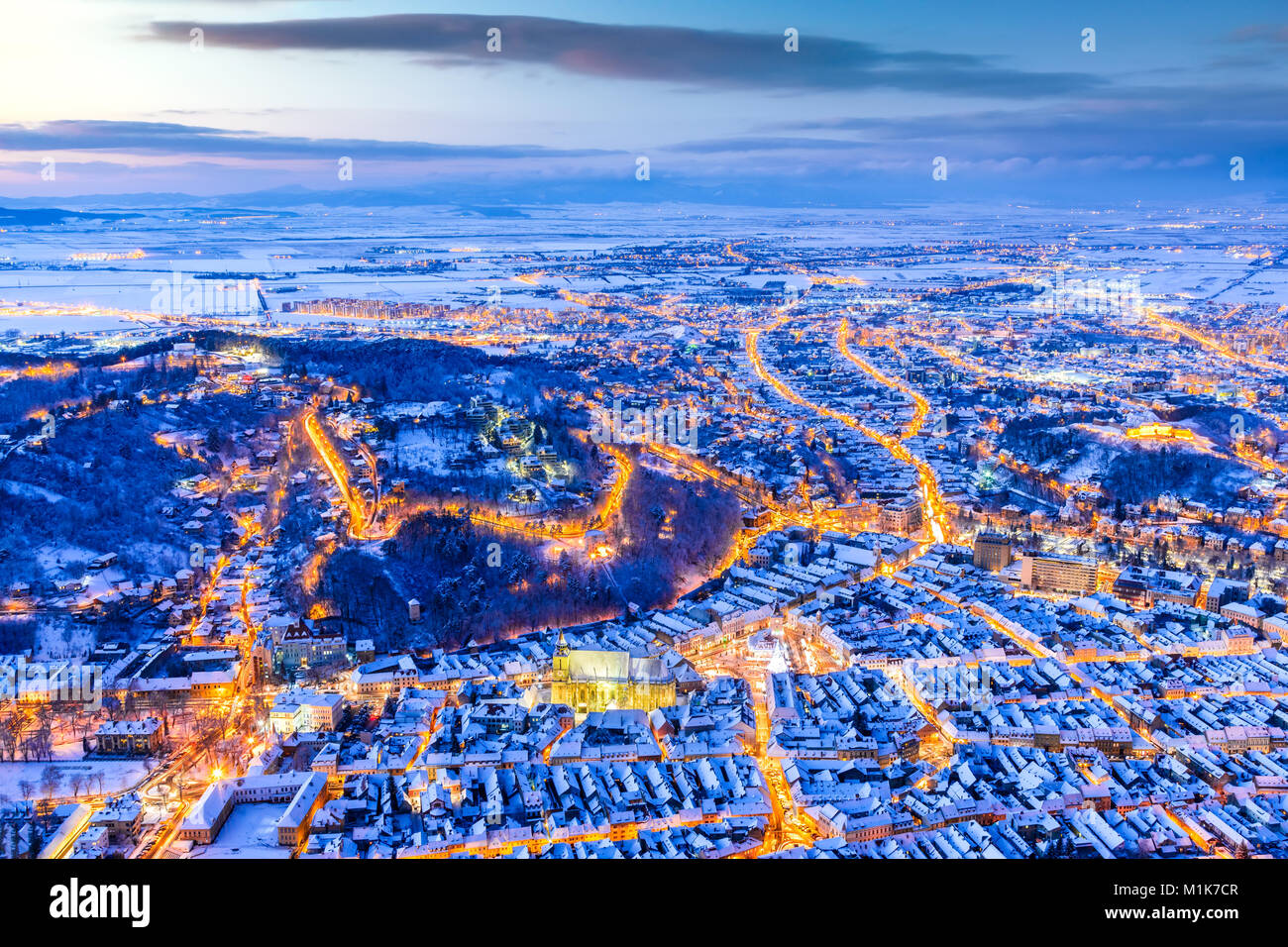 Brasov, Romania. Aerial view of medieval city and Main Square, with Xmas Tree and lights Transylvania landmark, Eastern Europe Stock Photo